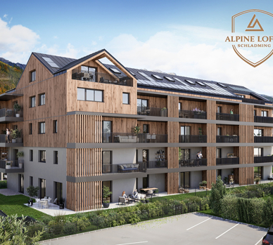 Modernes Holz-Wohngebäude im Alpenstil mit Balkonen und Bergen