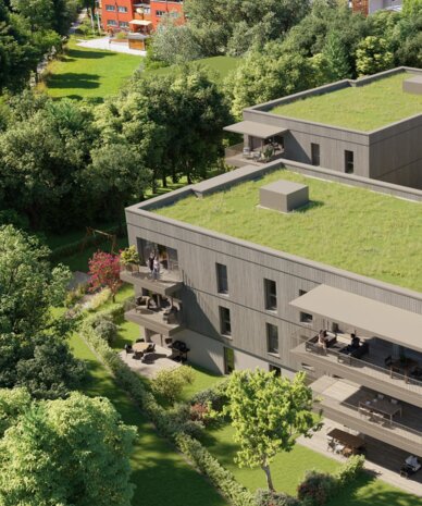 Moderne Wohnanlage mit Gründächern am Flussufer