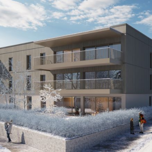Modern apartment building in a snowy winter landscape | © Maria Gruber