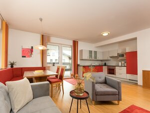 Open-plan living area with kitchen and dining space
