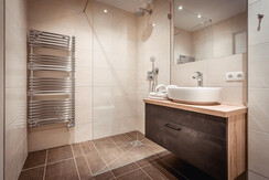 Bathroom 1 with shower and washbasin Bathroom 1 with shower and washbasin