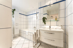 Bathroom with bathtub and toilet  Bathroom with bathtub and toilet