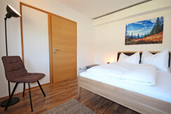 Bedroom 3 with queen-size bed on the first floor Bedroom 3 with queen-size bed on the first floor