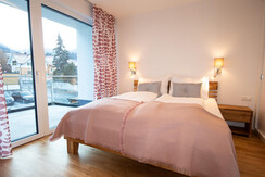 Neualm Top 5 - Bedroom with access to the terrace Neualm Top 5 - Bedroom with access to the terrace