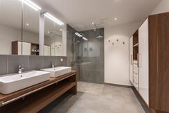 Bathroom with double wash basin and shower Bathroom with double wash basin and shower