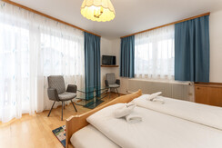 Bedroom 2 with tv and seating Bedroom 2 with tv and seating