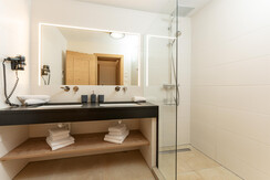 Bathroom with shower & double washbasin Bathroom with shower & double washbasin