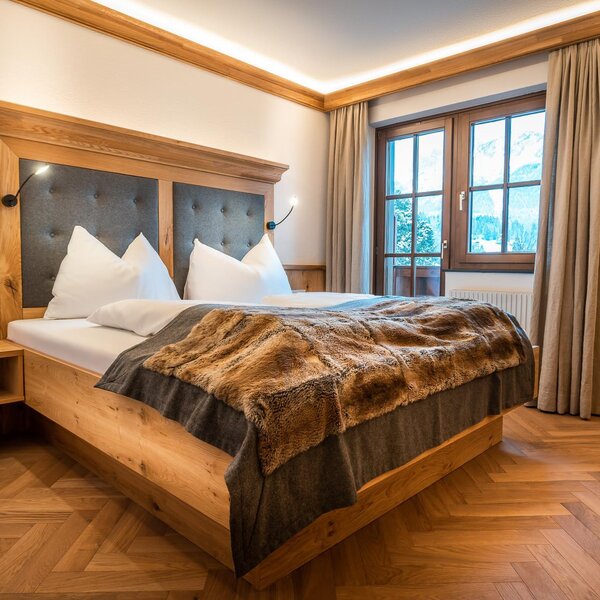 Bedrooms, partly with balcony and mountain view