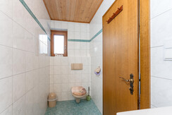 Top 2 - Toilet in bathroom 1 Top 2 - Toilet in bathroom 1