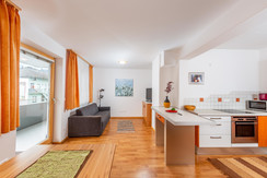 Living room with balcony and sofa Living room with balcony and sofa
