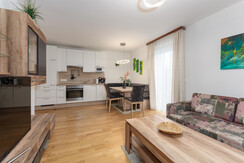 Top 2 - spacious living room with sofa and kitchen Top 2 - spacious living room with sofa and kitchen