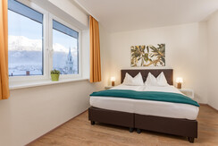 Top 2 Ein Schlafzimmer mit Doppel- und Einzelbett Top 2 Ein Schlafzimmer mit Doppel- und Einzelbett