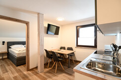 Club House Top 1 - Open kitchen and living area Club House Top 1 - Open kitchen and living area