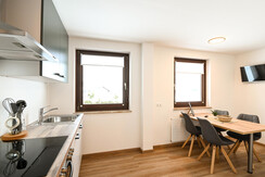 Club House Top 3 - Open living & kitchen area Club House Top 3 - Open living & kitchen area