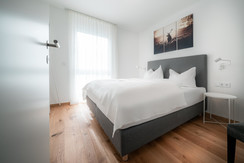 Master bedroom with box spring bed Master bedroom with box spring bed