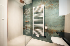 Bathroom with rain shower and washbasin Bathroom with rain shower and washbasin