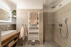 Bathroom with washbasin and rain shower  Bathroom with washbasin and rain shower