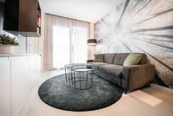 Wohnzimmer mit direktem Balkonzugang Wohnzimmer mit direktem Balkonzugang