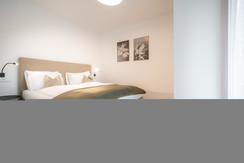 Second bedroom with cozy box spring bed Second bedroom with cozy box spring bed