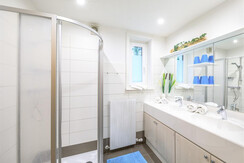Bathroom with double wash basin and shower Bathroom with double wash basin and shower