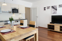 Dining table and living area Dining table and living area