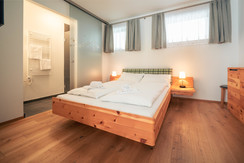One of the master bedrooms with en-suite bathroom One of the master bedrooms with en-suite bathroom