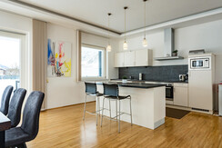 Penthouse open living & kitchen area Penthouse open living & kitchen area