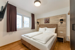 Bedroom with double bed and TV Bedroom with double bed and TV
