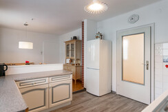Kitchen with dining area Kitchen with dining area