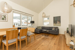 Eat-in kitchen with dining table and sofa Eat-in kitchen with dining table and sofa