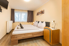 Master bedroom with comfortable double bed Master bedroom with comfortable double bed