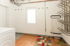 Ski storage room with ski boot dryer & washing machine Ski storage room with ski boot dryer & washing machine